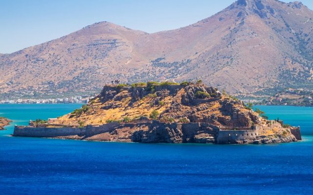 Spinalonga island at turquise water of Crete